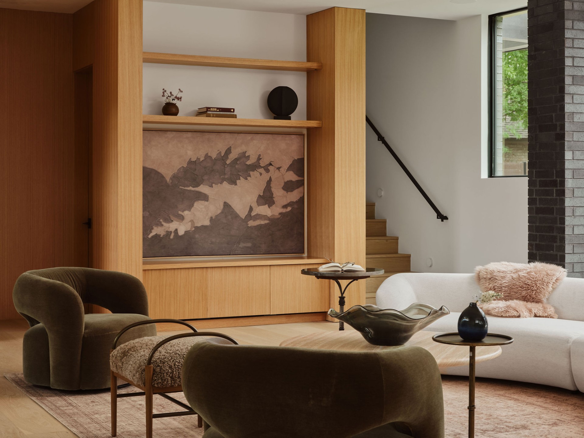 Refined Austin luxury living room with custom millwork, designer furnishings, and curated art, illustrating the bespoke features that complicate high-end home valuation