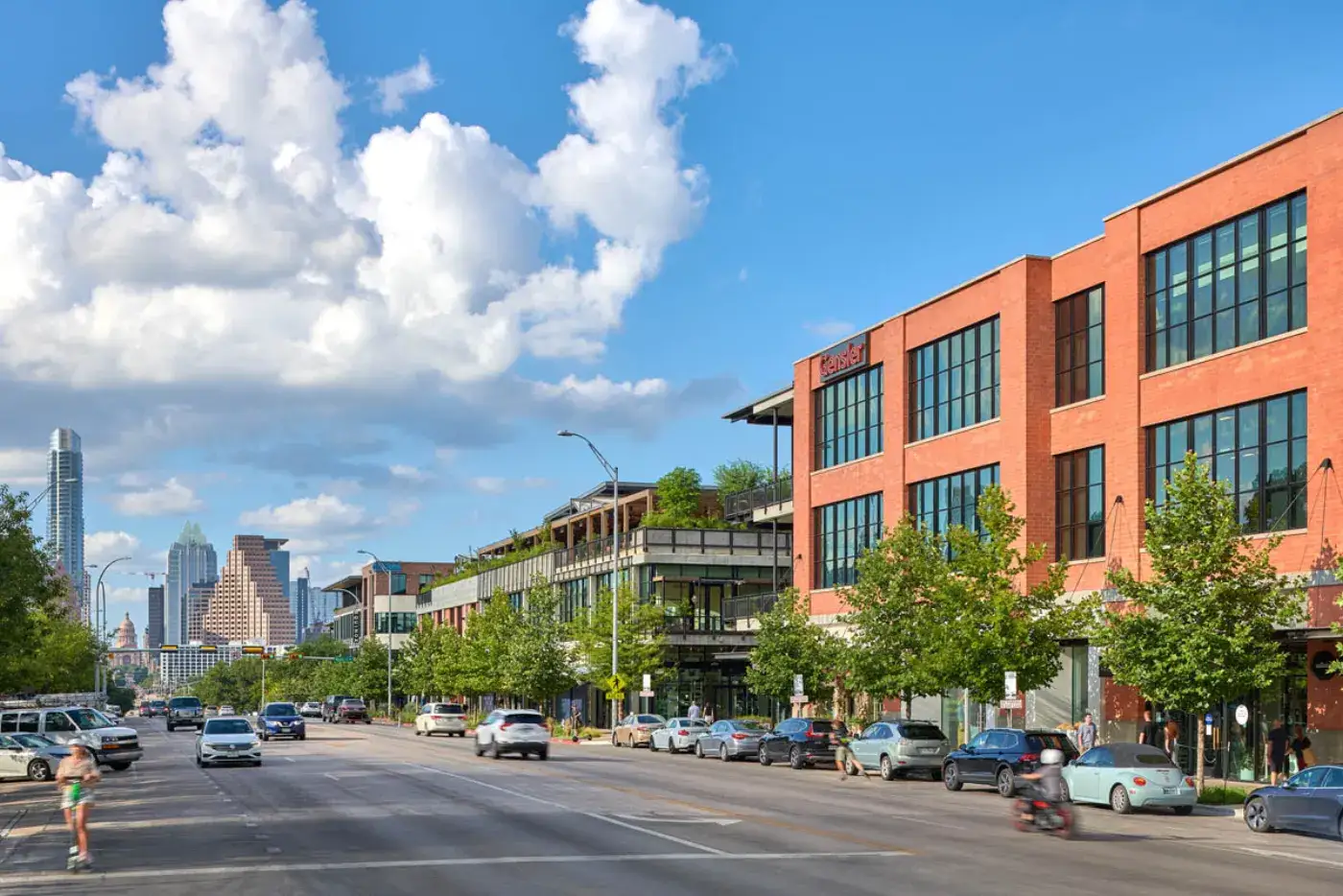 Music Lane mixed-use development on South Congress with downtown Austin skyline