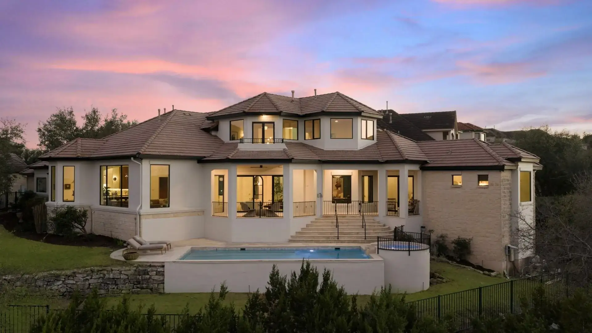 Refined Austin luxury home exterior at dusk, discreet seller representation
